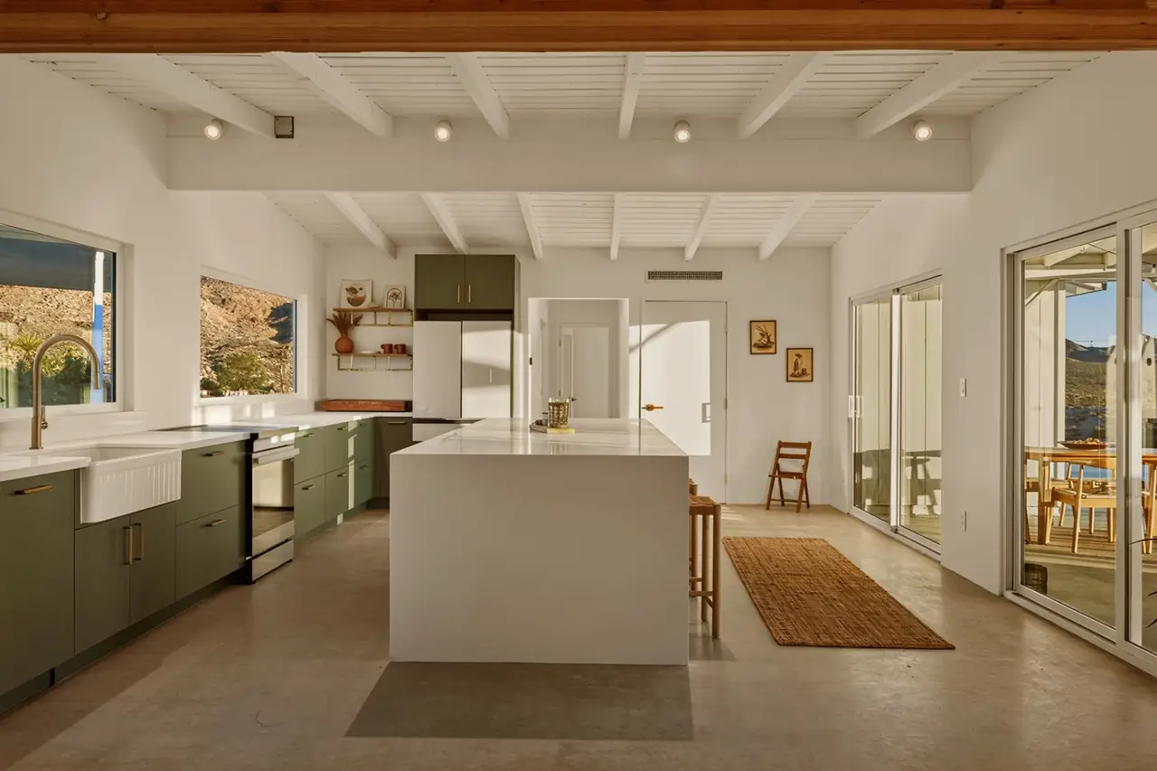 Chef's kitchen with island and mountain views