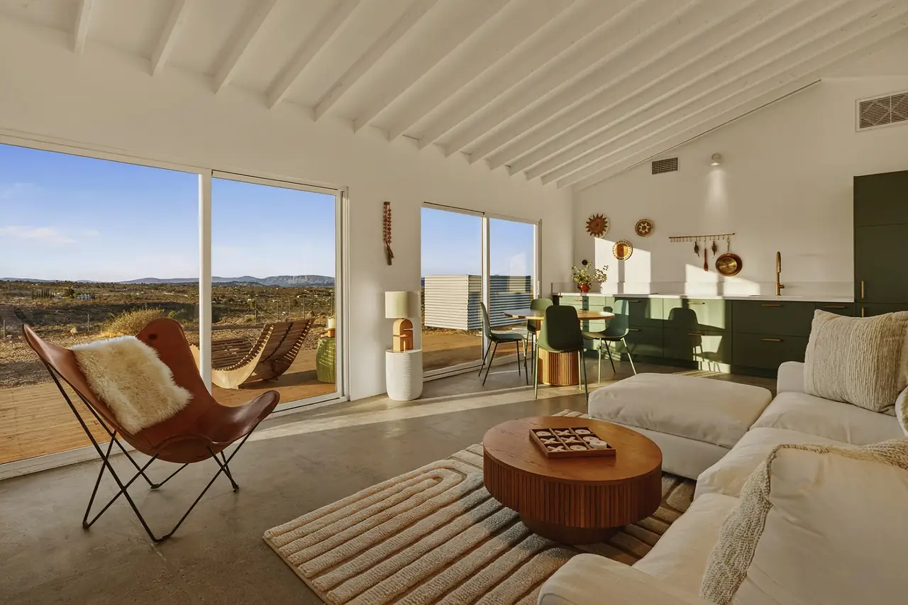 Casita living room with butterfly chair and desert view